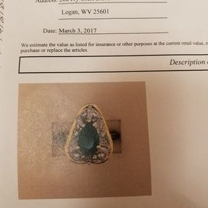 Emeral and diamond ring